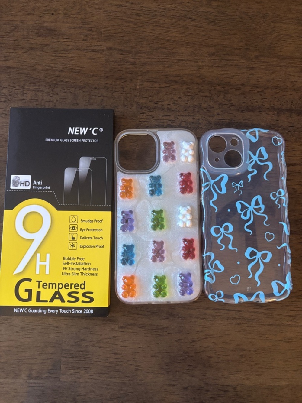 iPhone 15- 2 decorative phone cases and 1 tempered glass screen protector